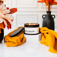 Load image into Gallery viewer, Candle labeled &#39;Honey Spiced Pear&#39; with decorative elements on a white surface
